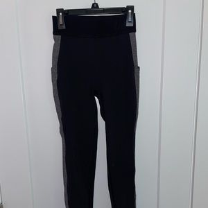 Lululemon Black leggings with grey stripe down the side, size 4